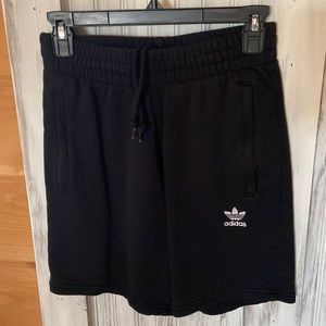 Black adidas sweatpants shorts.